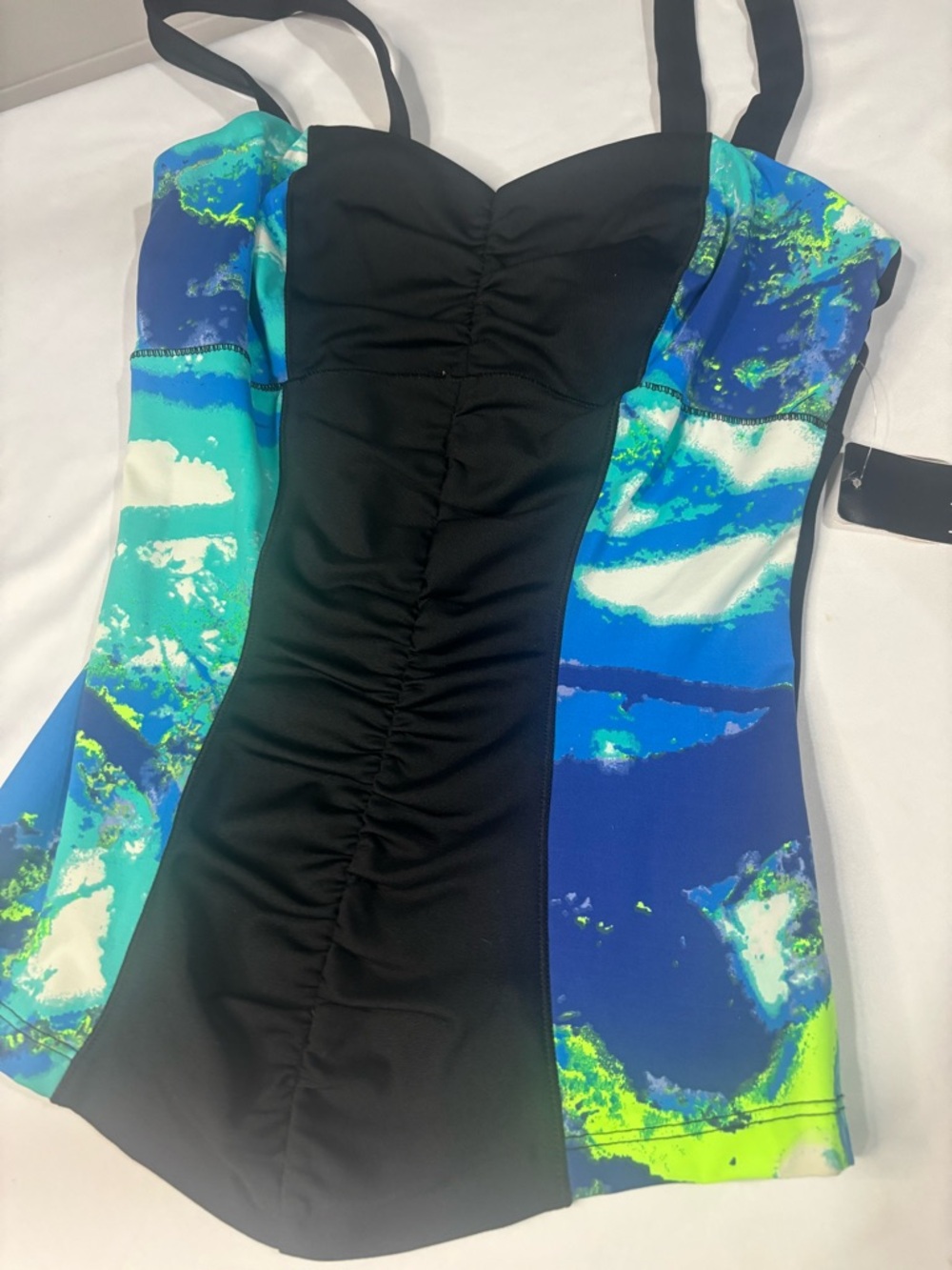 Y2K Made in the USA
Bebe Black Strapless top with Blue & Aqua Print Panels